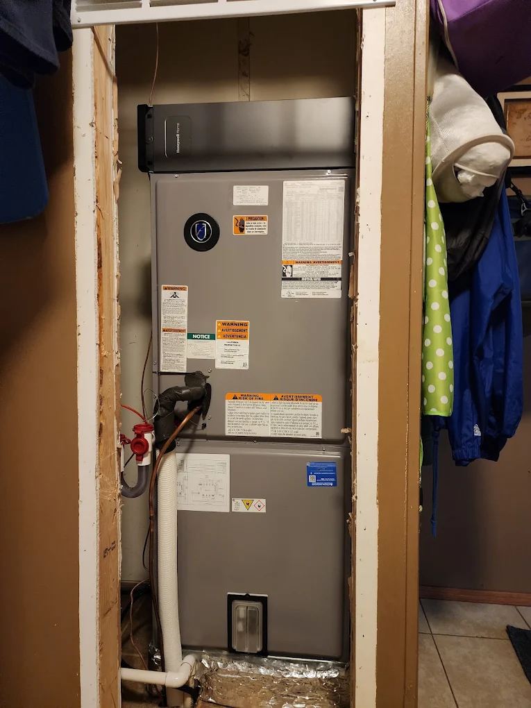 Closet air handler with Honeywell filtration installed by JHC Services