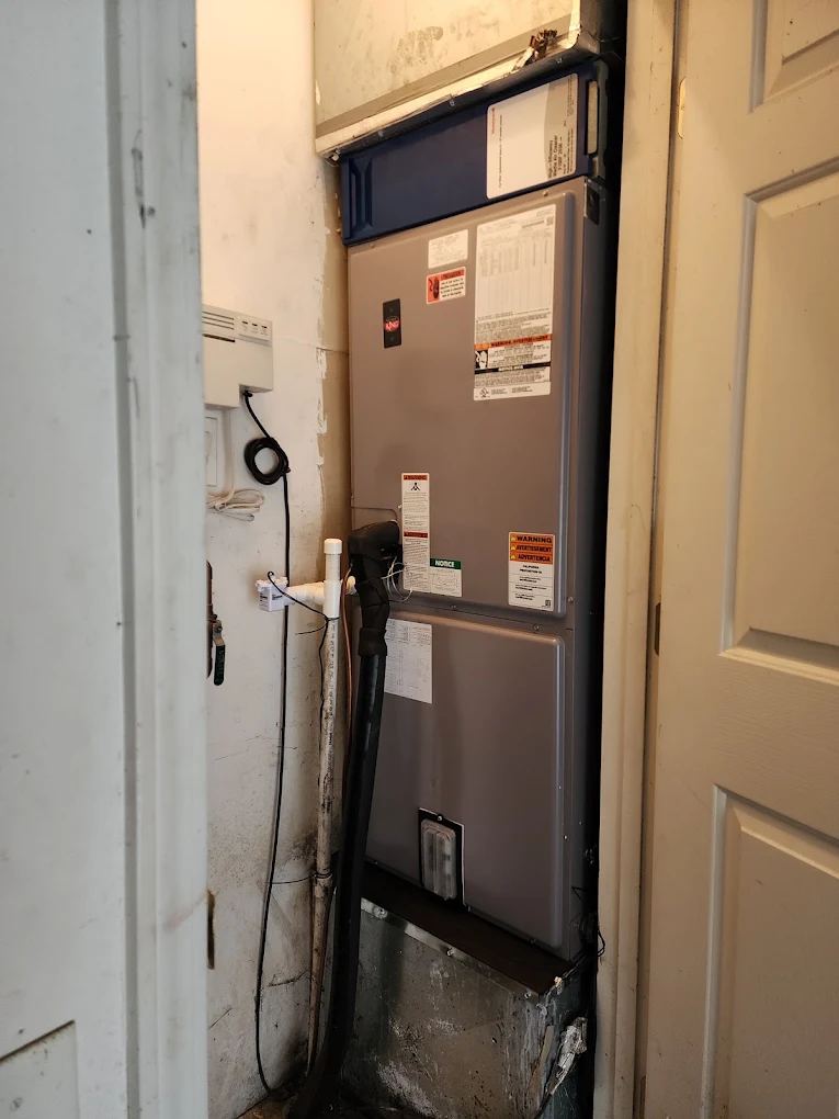 Air handler installed in a tight utility closet