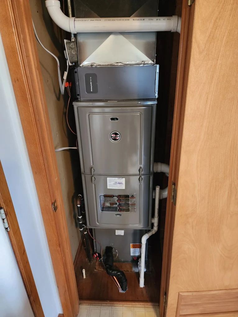 Closet furnace and air handler stack installed by JHC Services